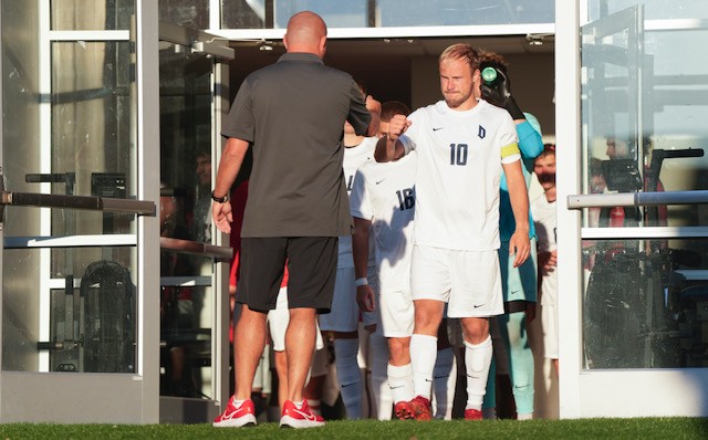 Maxi and Coach at soccer